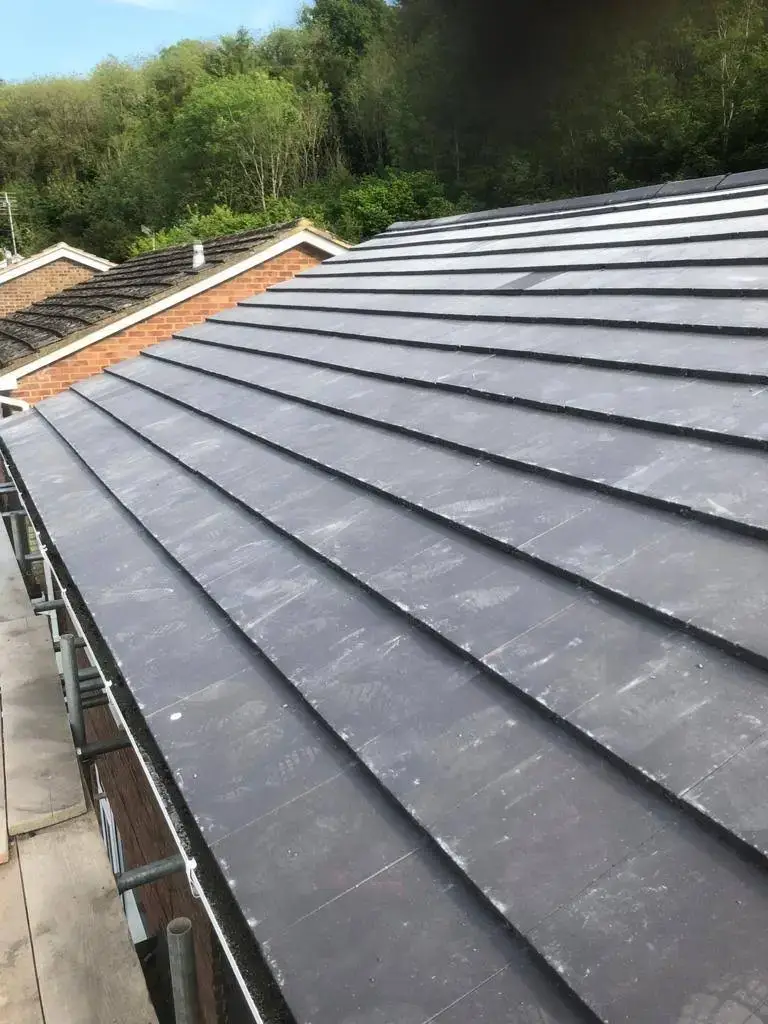 Low-pitch roof stripped and re-covered by A-List Roofing — finished
