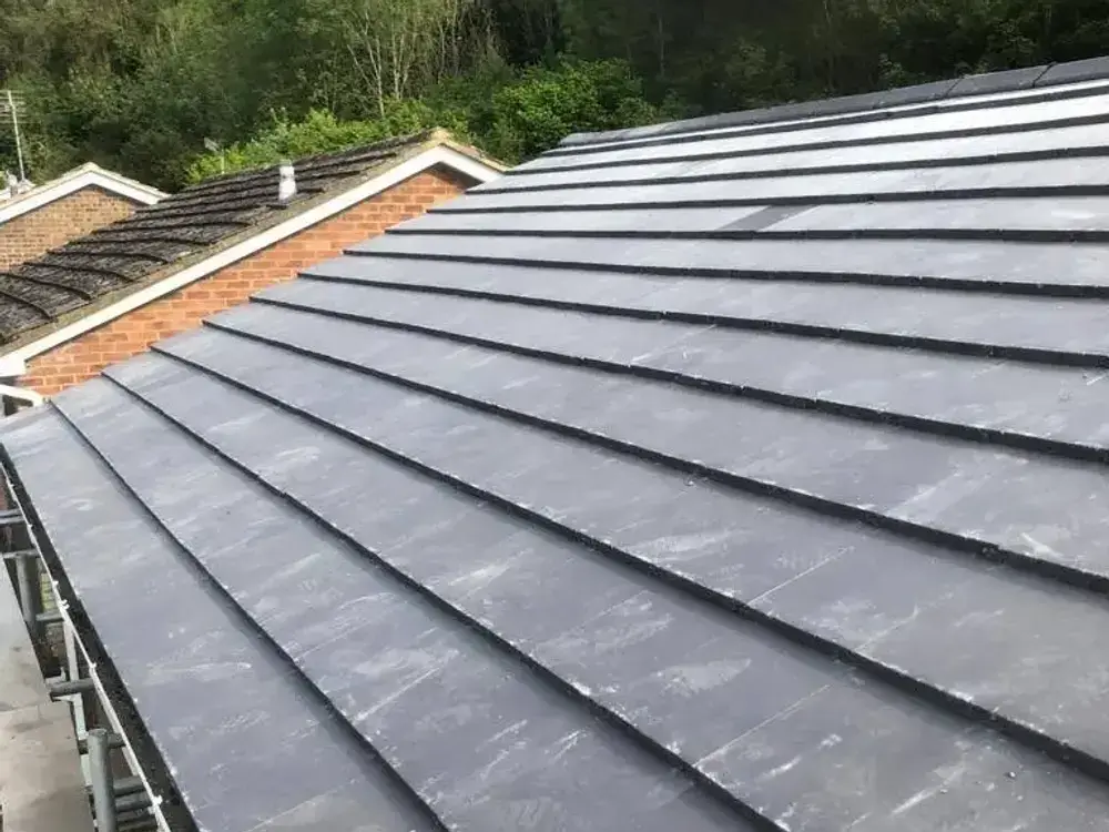 The same roof re-covered with new interlocking tiles by A-List Roofing
