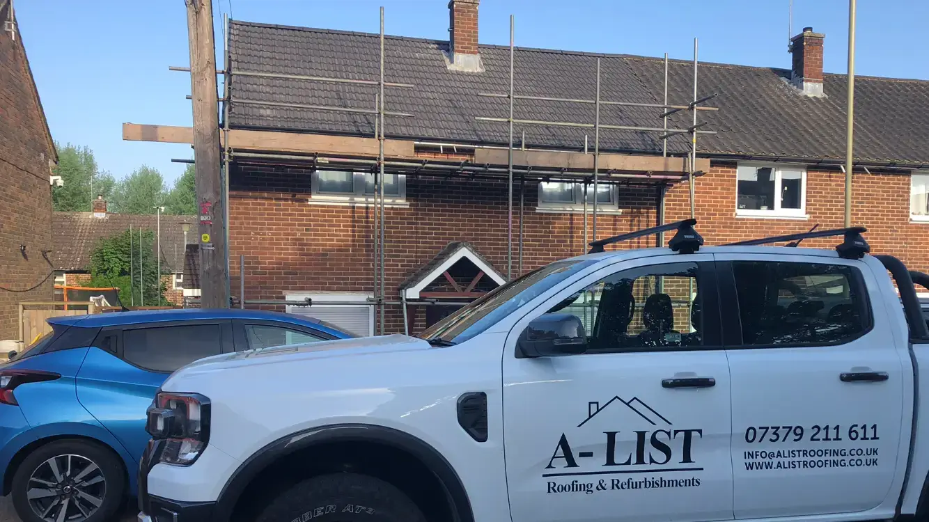 Terraced house re-roof by A-List Roofing — scaffold up